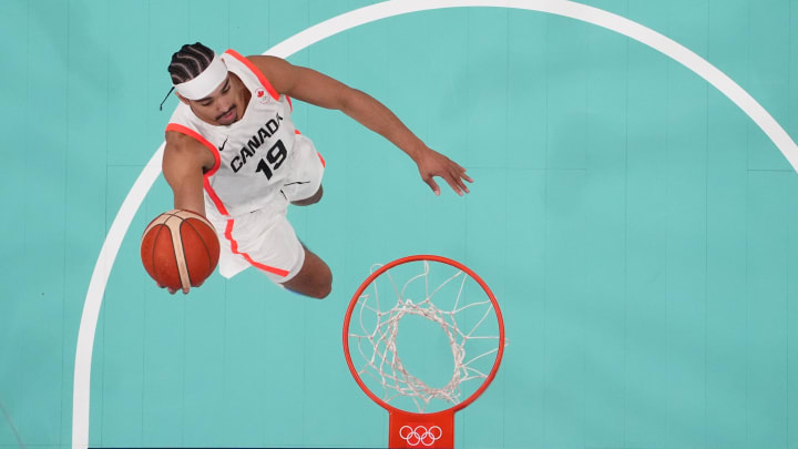 Aug 2, 2024; Villeneuve-d'Ascq, France; Canada point guard Andrew Nembhard (19) shoots against Spain in the first half in a men’s group A basketball game during the Paris 2024 Olympic Summer Games at Stade Pierre-Mauroy. Mandatory Credit: John David Mercer-USA TODAY Sports Aug 2, 2024; Villeneuve-d'Ascq, France; Canada point guard Andrew Nembhard (19) shoots against Spain in the first half in a men’s group A basketball game during the Paris 2024 Olympic Summer Games at Stade Pierre-Mauroy. Mandatory Credit: John David Mercer-USA TODAY Sports