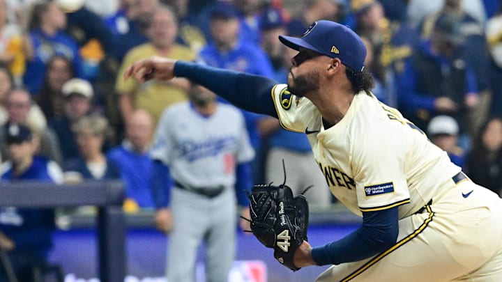 Oct 14, 2025; Milwaukee, Wisconsin, USA; Milwaukee Brewers pitcher Freddy Peralta (51) throws a pitch against the Los Angeles Dodgers in the first inning during game two of the NLCS round for the 2025 MLB playoffs at American Family Field. Mandatory Credit: Benny Sieu-Imagn Images