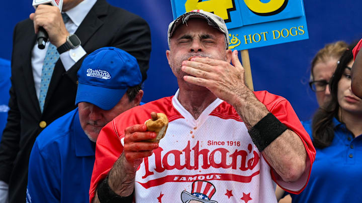 Geoffrey Esper Competes In Nathan's Annual Hot Dog Eating Contest