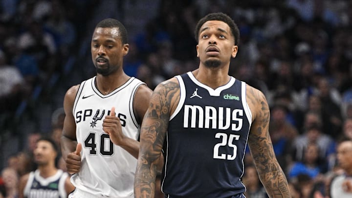 Oct 24, 2024; Dallas, Texas, USA; San Antonio Spurs forward Harrison Barnes (40) and Dallas Mavericks forward P.J. Washington (25) in action during the game between the Dallas Mavericks and the San Antonio Spurs at the American Airlines Center. Mandatory Credit: Jerome Miron-Imagn Images