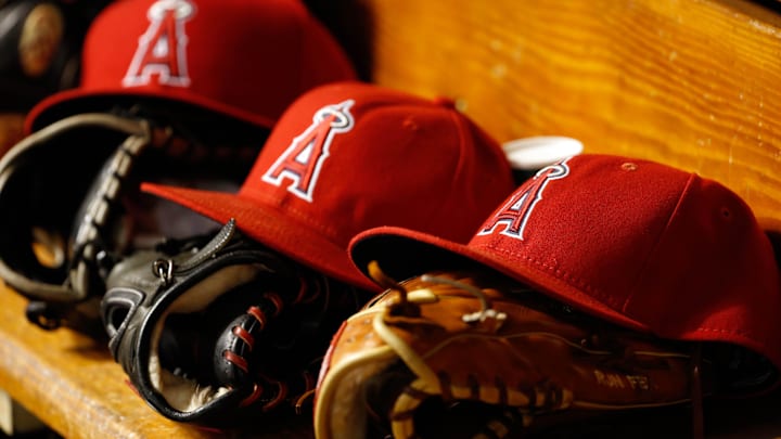 Jul 5, 2016; St. Petersburg, FL, USA; Los Angeles Angels hats and gloves lay in the dugout against the Tampa Bay Rays at Tropicana Field. Mandatory Credit: Kim Klement-Imagn Images Jul 5, 2016; St. Petersburg, FL, USA; Los Angeles Angels hats and gloves lay in the dugout against the Tampa Bay Rays at Tropicana Field. Mandatory Credit: Kim Klement-Imagn Images