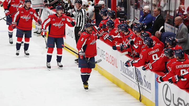 Apr 4, 2025; Washington, District of Columbia, USA; Washington Capitals left wing Alex Ovechkin (8) celebrates with players on the bench after scoring a goal against the Chicago Blackhawks during the first period at Capital One Arena. Mandatory Credit: Amber Searls-Imagn Images