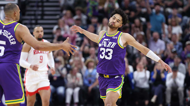 Apr 11, 2024; Salt Lake City, Utah, USA; Utah Jazz guard Johnny Juzang (33) reacts to a shot against the Houston Rockets during the fourth quarter at Delta Center. Mandatory Credit: Rob Gray-Imagn Images