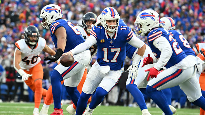 Jan 12, 2025; Orchard Park, New York, USA; Buffalo Bills quarterback Josh Allen (17) hands the ball off to running back Ty Johnson (26) Jan 12, 2025; Orchard Park, New York, USA; Buffalo Bills quarterback Josh Allen (17) hands the ball off to running back Ty Johnson (26)