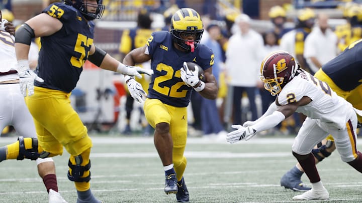 Sep 13, 2025; Ann Arbor, Michigan, USA; Michigan Wolverines running back Justice Haynes (22) rushes in the first half against the Central Michigan Chippewas at Michigan Stadium. Mandatory Credit: Rick Osentoski-Imagn Images Sep 13, 2025; Ann Arbor, Michigan, USA; Michigan Wolverines running back Justice Haynes (22) rushes in the first half against the Central Michigan Chippewas at Michigan Stadium. Mandatory Credit: Rick Osentoski-Imagn Images