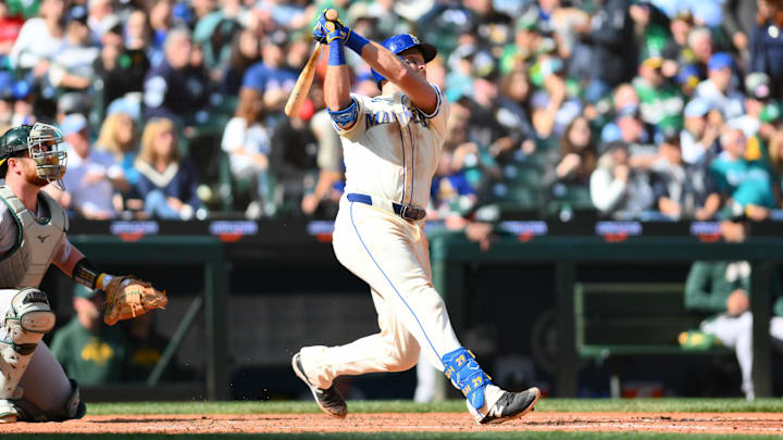 Seattle Mariners catcher Cal Raleigh hits a two-run home run against the Oakland Athletics on Sept. 29 at T-Mobile Park.