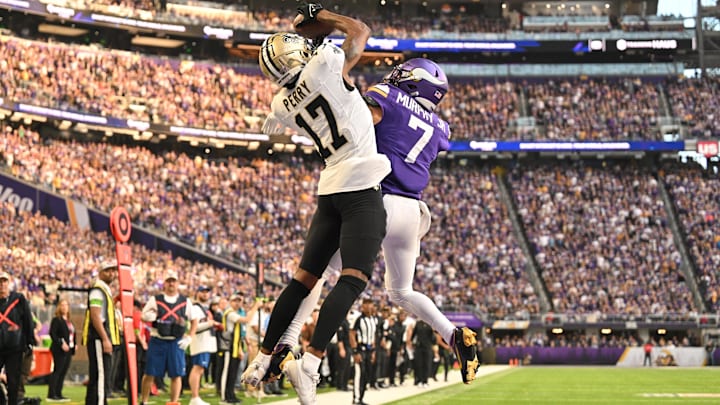 Nov 12, 2023; Minneapolis, Minnesota, USA; New Orleans Saints wide receiver A.T. Perry (17) catches a touchdown pass over Minnesota Vikings cornerback Byron Murphy Jr. (7) during the fourth quarter at U.S. Bank Stadium. Nov 12, 2023; Minneapolis, Minnesota, USA; New Orleans Saints wide receiver A.T. Perry (17) catches a touchdown pass over Minnesota Vikings cornerback Byron Murphy Jr. (7) during the fourth quarter at U.S. Bank Stadium.