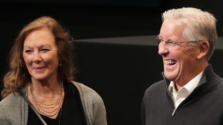 Jan 27, 2025; Las Vegas, NV, USA; Las Vegas Raiders coach Pete Carroll (right) with wife Glena Goranson at press conference at Intermountain Health Performance Center. Mandatory Credit: Kirby Lee-Imagn Images