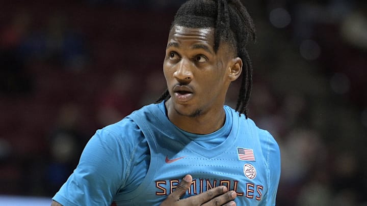 Feb 19, 2025; Tallahassee, Florida, USA; Florida State Seminoles forward Jamir Watkins (1) reacts after missing a shot during the first half against the Miami Hurricanes at Donald L. Tucker Center. Mandatory Credit: Melina Myers-Imagn Images