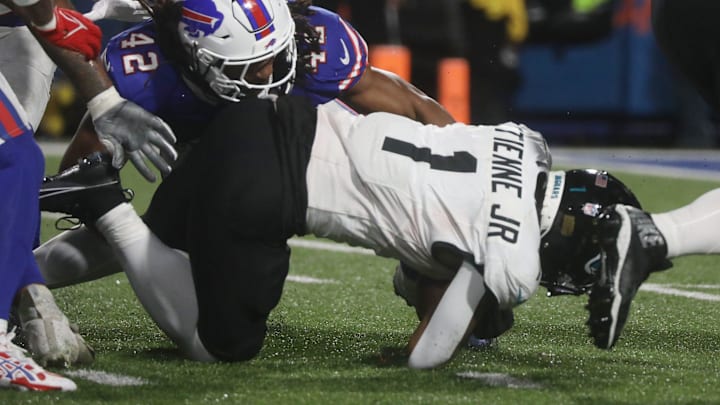 Bills Dorian Williams tackles Jaguars Travis Etienne Jr. during the second half at Highmark Stadium in Orchard Park on Sept. 23, 2024.