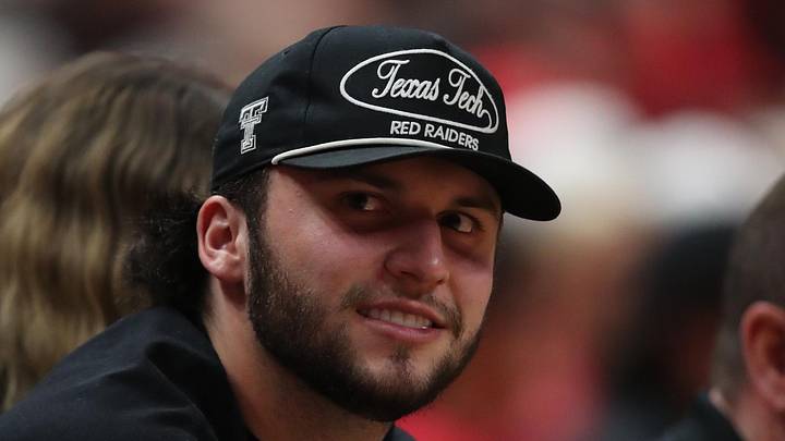 Texas Tech Red Raiders quarterback Brendan Sorsby watches a basketball game