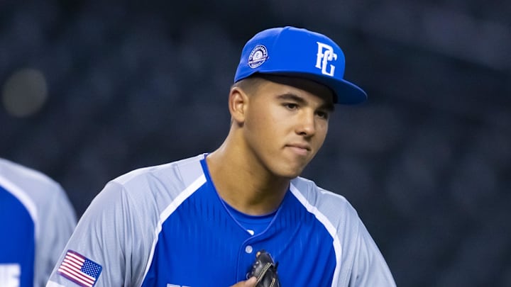 Aug 28, 2022; Phoenix, Arizona, US; East infielder Daniel Cuvet (15) during the Perfect Game All-American Classic high school baseball game at Chase Field. Mandatory Credit: Mark J. Rebilas-Imagn Images Aug 28, 2022; Phoenix, Arizona, US; East infielder Daniel Cuvet (15) during the Perfect Game All-American Classic high school baseball game at Chase Field. Mandatory Credit: Mark J. Rebilas-Imagn Images