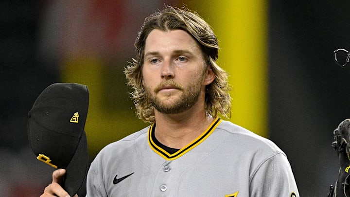 Apr 21, 2026; Arlington, Texas, USA; Pittsburgh Pirates starting pitcher Carmen Mlodzinski (50) looks on during the game between the Rangers and the Pirates at Globe Life Field. Mandatory Credit: Jerome Miron-Imagn Images