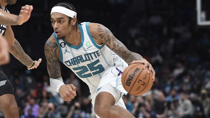 Oct 31, 2022; Charlotte, North Carolina, USA; Charlotte Hornets forward center PJ Washington (25) dribbles the ball during the second half against the Sacramento Kings at the Spectrum Center. Mandatory Credit: Sam Sharpe-Imagn Images