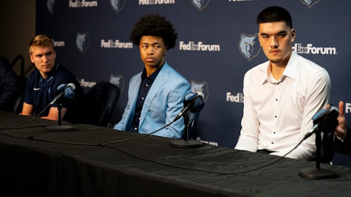 Grizzlies 2024 NBA Draft picks Cam Spencer, Jaylen Wells, and Zach Edey listen during a press conference to introduce the team’s picks at FedExForum on Friday, June 28, 2024.