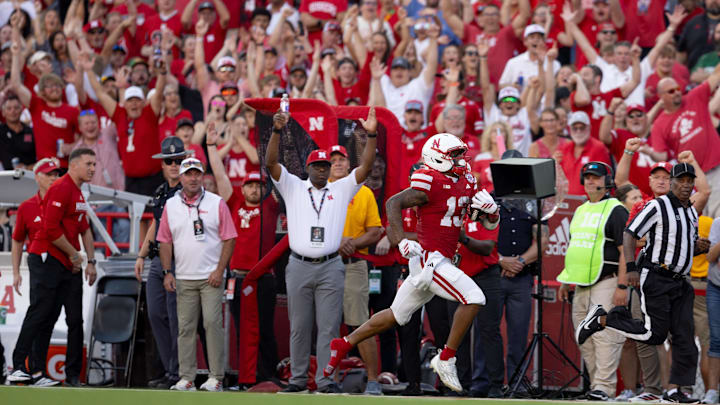 Nebraska wide receiver Nyziah Hunter, wearing one shoe, scores touchdown vs. Michigan State.