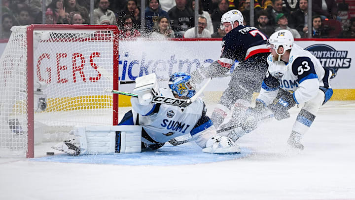 Feb 13, 2025; Montreal, Quebec, CAN; [Imagn Images direct customers only] Team USA forward Brady Tkachuk (7) scores a goal against Team Finland goalie Juuse Saros (74) in the third period during a 4 Nations Face-Off ice hockey game at Bell Centre. Mandatory Credit: David Kirouac-Imagn Images