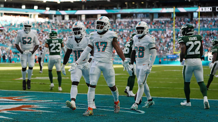 Dec 8, 2024; Miami Gardens, Florida, USA; Miami Dolphins wide receiver Jaylen Waddle (17) celebrates after making a catch for the two point conversion during the second half against the New York Jets at Hard Rock Stadium. Mandatory Credit: Jasen Vinlove-Imagn Images Dec 8, 2024; Miami Gardens, Florida, USA; Miami Dolphins wide receiver Jaylen Waddle (17) celebrates after making a catch for the two point conversion during the second half against the New York Jets at Hard Rock Stadium. Mandatory Credit: Jasen Vinlove-Imagn Images