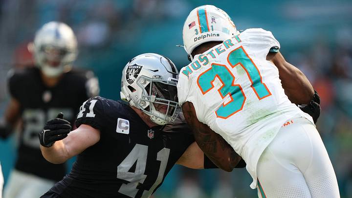 Nov 19, 2023; Miami Gardens, Florida, USA; Las Vegas Raiders linebacker Robert Spillane (41) tackles Miami Dolphins running back Raheem Mostert (31) during the first half at Hard Rock Stadium. Mandatory Credit: Jasen Vinlove-USA TODAY Sports Nov 19, 2023; Miami Gardens, Florida, USA; Las Vegas Raiders linebacker Robert Spillane (41) tackles Miami Dolphins running back Raheem Mostert (31) during the first half at Hard Rock Stadium. Mandatory Credit: Jasen Vinlove-USA TODAY Sports