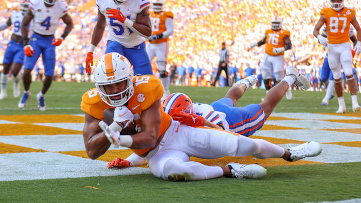 Sep 24, 2022; Knoxville, Tennessee, USA; Tennessee Volunteers wide receiver Bru McCoy (15) catches a pass in the end zone for a touchdown against the Florida Gators during the first half at Neyland Stadium. Mandatory Credit: Randy Sartin-Imagn Images