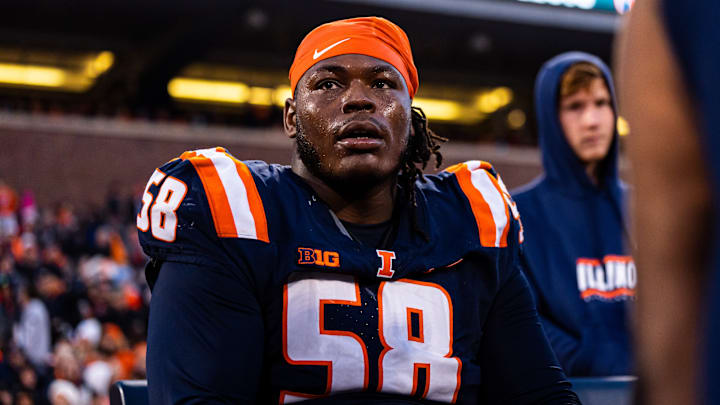 Illinois offensive tackle Melvin Priestly (58) looks on between offensive series during the Illini's 38-16 win over Michigan State on Nov. 16 at Memorial Stadium in Champaign, Illinois. Illinois offensive tackle Melvin Priestly (58) looks on between offensive series during the Illini's 38-16 win over Michigan State on Nov. 16 at Memorial Stadium in Champaign, Illinois.