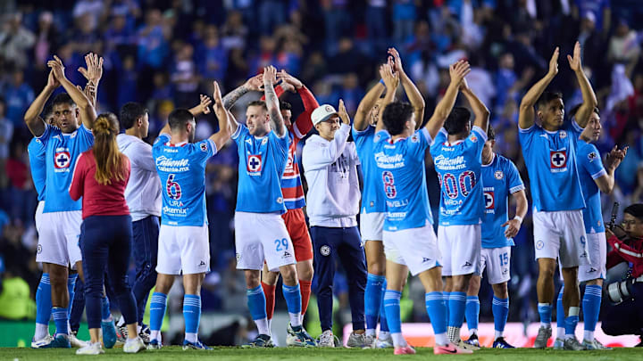 Cruz Azul players celebrate after coming back from three goals down to secure a place in the Apertura 2024 semifinals.