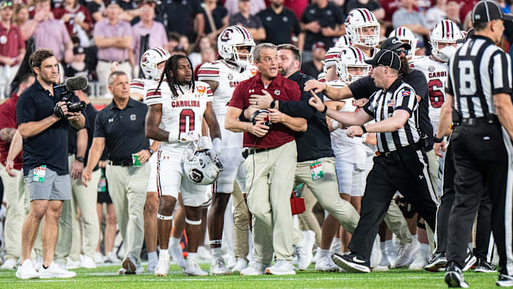 Dec 31, 2024; Orlando, FL, USA; South Carolina Gamecocks head coach Shane Beamer reacts to the Illinois Fighting Illini in the third quarter at Camping World Stadium. Mandatory Credit: Jeremy Reper-Imagn Images