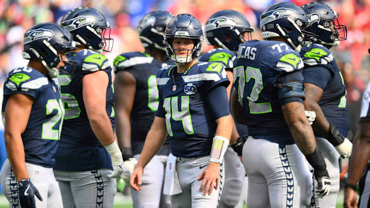 Sep 7, 2025; Seattle, Washington, USA; Seattle Seahawks quarterback Sam Darnold (14) during a TV timeout during the second half against San Francisco 49ers at Lumen Field. 