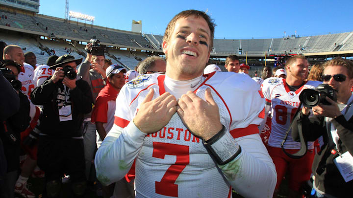 Houston Cougars quarterback Case Keenum (7) smiles after victory against the Penn State Nittany Lions at the Cotton Bowl. 