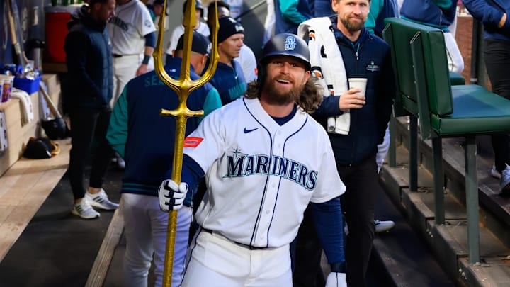 Mar 26, 2026; Seattle, Washington, USA; Seattle Mariners third baseman Brendan Donovan (33) celebrates in the dugout after hitting a home run against the Cleveland Guardians during the first inning at T-Mobile Park. Mandatory Credit: Steven Bisig-Imagn Images