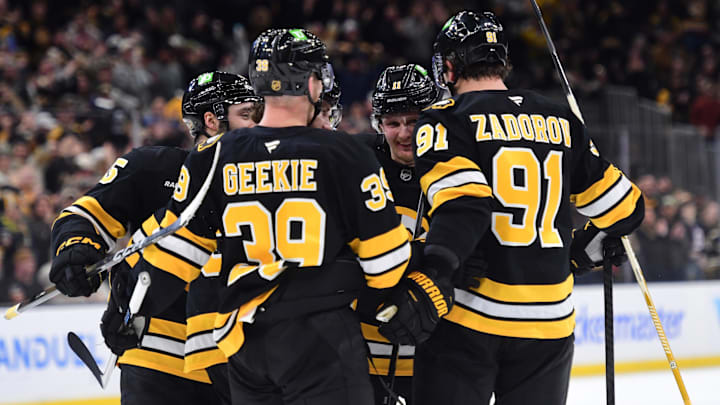 Mar 28, 2026; Boston, Massachusetts, USA; Boston Bruins center Morgan Geekie (39), defenseman Nikita Zadorov (91), center Casey Mittelstadt (11) and defenseman Jonathan Aspirot (45) celebrate a goal by center Pavel Zacha (18) during the third period against the Minnesota Wild at TD Garden. Mandatory Credit: Bob DeChiara-Imagn Images Mar 28, 2026; Boston, Massachusetts, USA; Boston Bruins center Morgan Geekie (39), defenseman Nikita Zadorov (91), center Casey Mittelstadt (11) and defenseman Jonathan Aspirot (45) celebrate a goal by center Pavel Zacha (18) during the third period against the Minnesota Wild at TD Garden. Mandatory Credit: Bob DeChiara-Imagn Images