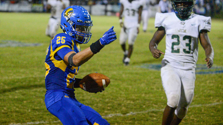 North Side's Javonte Smith (25) signals a first down after converting the fourth down conversion attempt following a JCM penalty during the CommissionerÕs Cup football match between Jackson Central-Merry vs Jackson North Side in Jackson, Tenn., on Friday, Oct. 4, 2024.
