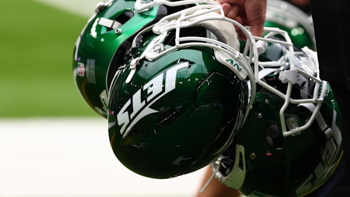 Oct 6, 2024; Tottenham, ENG; New York Jets helmets are held by staff before the match against Minnesota Vikings at Tottenham Hotspur Stadium. Mandatory Credit: Shaun Brooks-Imagn Images Oct 6, 2024; Tottenham, ENG; New York Jets helmets are held by staff before the match against Minnesota Vikings at Tottenham Hotspur Stadium. Mandatory Credit: Shaun Brooks-Imagn Images