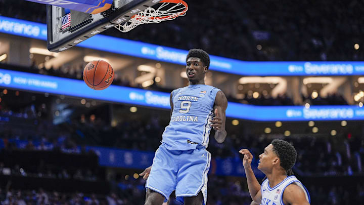 Mar 14, 2025; Charlotte, NC, USA; North Carolina Tar Heels guard Drake Powell (9) with a dunk against the Duke Blue Devils during the first half at Spectrum Center. Mandatory Credit: Jim Dedmon-Imagn Images
