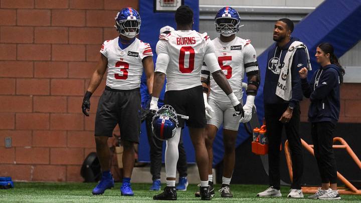 May 21, 2026; East Rutherford, NJ, USA; New York Giants outside linebacker Abdul Carter (3), linebacker Brian Burns (0) and linebacker Kayvon Thibodeaux (5) talk during organized team activities at Quest Diagnostics Training Center. May 21, 2026; East Rutherford, NJ, USA; New York Giants outside linebacker Abdul Carter (3), linebacker Brian Burns (0) and linebacker Kayvon Thibodeaux (5) talk during organized team activities at Quest Diagnostics Training Center.