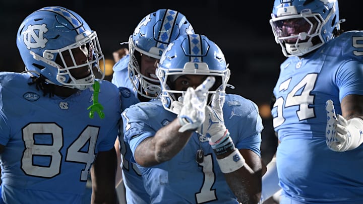 Nov 22, 2025; Chapel Hill, North Carolina, USA; North Carolina Tar Heels wide receiver Jordan Shipp (1) celebrates after a touchdown during the second half at Kenan Stadium. Mandatory Credit: William Howard-Imagn Images