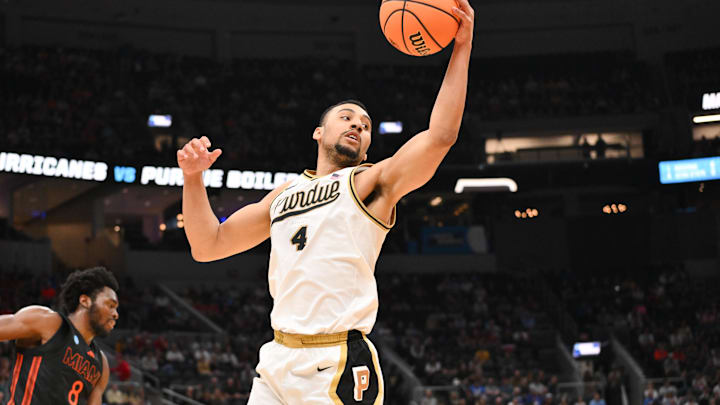 Purdue Boilermakers forward Trey Kaufman-Renn (4) grabs a rebound. Purdue Boilermakers forward Trey Kaufman-Renn (4) grabs a rebound.