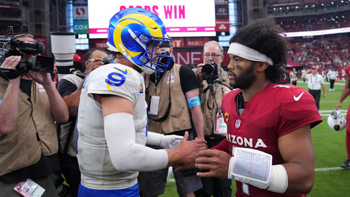 Sep 15, 2024; Glendale, Arizona, USA; Los Angeles Rams quarterback Matthew Stafford (9) and Arizona Cardinals quarterback Kyler Murray (1) shake hands after the game at State Farm Stadium. Mandatory Credit: Joe Camporeale-Imagn Images