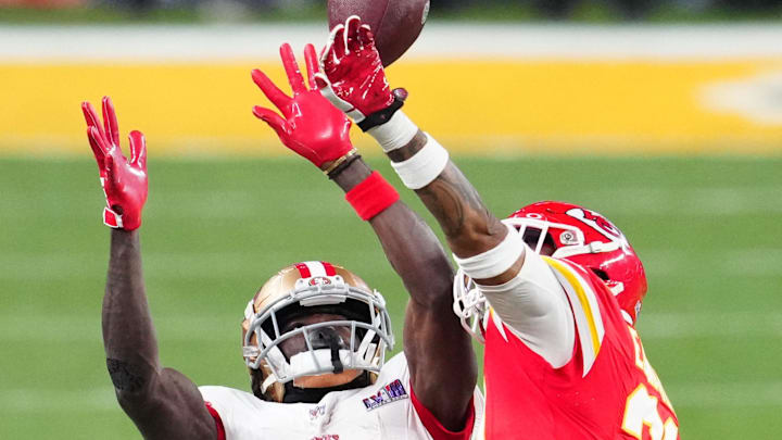 Feb 11, 2024; Paradise, Nevada, USA; Kansas City Chiefs safety Mike Edwards (21) breaks up a pass intended for San Francisco 49ers wide receiver Brandon Aiyuk (11) in the second half in Super Bowl LVIII at Allegiant Stadium. Mandatory Credit: Stephen R. Sylvanie-Imagn Images