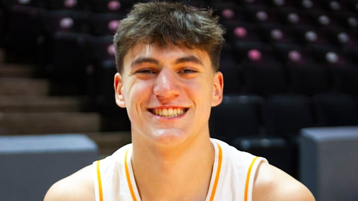 Tennessee forward JP Estrella (13) smiles at the Food City Center for Tennessee Basketball media day on Tuesday Oct. 3, 2023. Tennessee forward JP Estrella (13) smiles at the Food City Center for Tennessee Basketball media day on Tuesday Oct. 3, 2023.