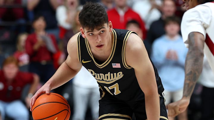 Purdue Boilermakers guard Omer Mayer (17) dribbles against Alabama Crimson Tide guard Labaron Philon (0) Purdue Boilermakers guard Omer Mayer (17) dribbles against Alabama Crimson Tide guard Labaron Philon (0)