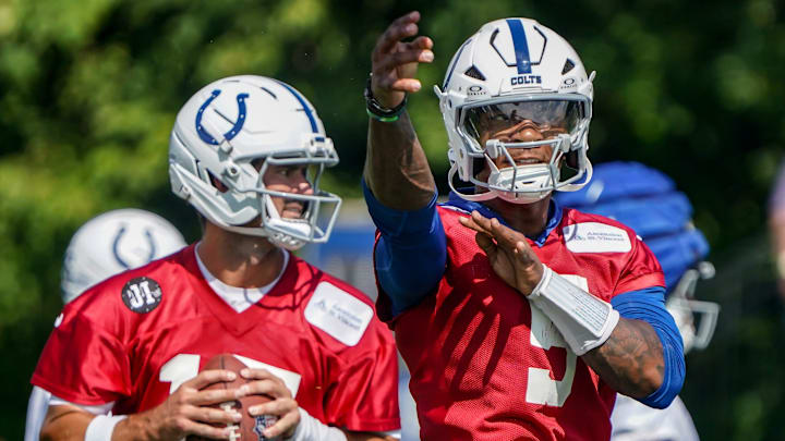Indianapolis Colts players Daniel Jones (17) and Anthony Richardson Sr. (5) throw passes during the Colts training camp at Grand Park on Saturday, July 26, 2025, in Westfield, Ind.