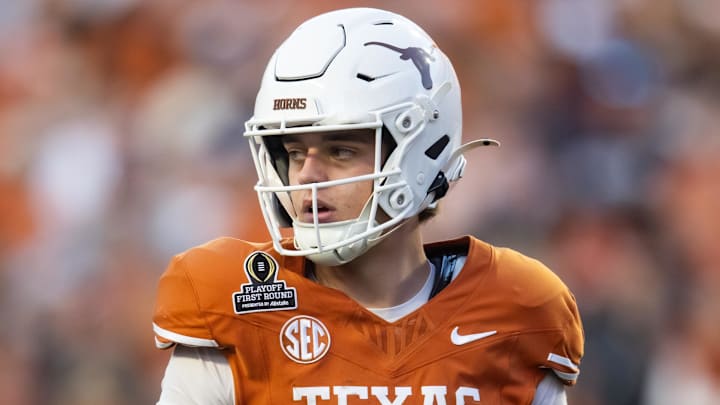 Dec 21, 2024; Austin, Texas, USA; Texas Longhorns quarterback Arch Manning (16) against the Clemson Tigers during the CFP National playoff first round at Darrell K Royal-Texas Memorial Stadium. Mandatory Credit: Mark J. Rebilas-Imagn Images