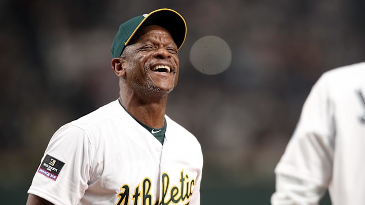 Mar 20, 2019; Tokyo, JPN; Oakland Athletics former left fielder Rickey Henderson laughs while participating in the Ceremonial First Pitch before the game between the Oakland Athletics and the Seattle Mariners at Tokyo Dome.