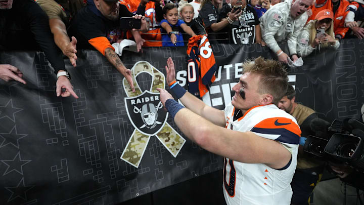 Nov 24, 2024; Paradise, Nevada, USA; Denver Broncos quarterback Bo Nix (10) greets fans after the game against the Las Vegas Raiders at Allegiant Stadium. 