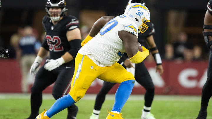 Los Angeles Chargers defensive tackle Teair Tart returns an interception against the Arizona Cardinals Los Angeles Chargers defensive tackle Teair Tart returns an interception against the Arizona Cardinals
