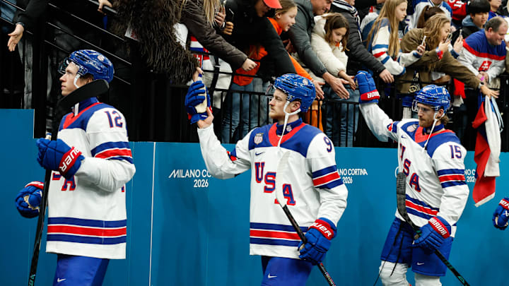 Feb 20, 2026; Milan, Italy; Jack Eichel (9) of the United States greets fans after the game against Slovakia in a men's ice hockey semifinal during the Milano Cortina 2026 Olympic Winter Games at Milano Santagiulia Ice Hockey Arena. Mandatory Credit: Geoff Burke-Imagn Images