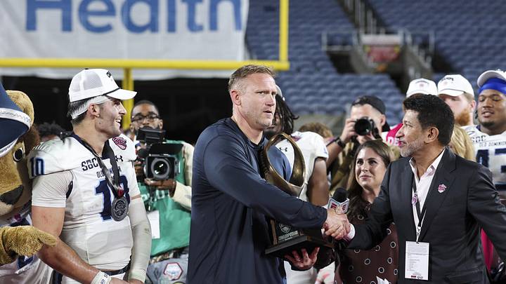 Dec 17, 2025; Orlando, FL, USA; Old Dominion Monarchs head coach Ricky Rahne reacts after beating the South Florida Bulls in the Cure Bowl at Camping World Stadium. Mandatory Credit: Nathan Ray Seebeck-Imagn Images