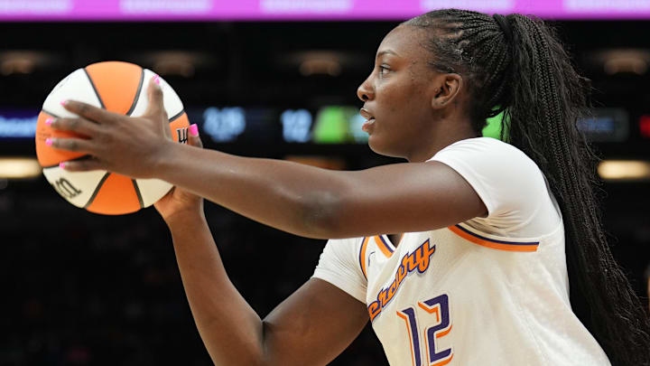 Aug 5, 2023; Phoenix, Arizona, USA; Phoenix Mercury forward Michaela Onyenwere (12) shoots against the Seattle Storm during the first half at Footprint Center. Mandatory Credit: Joe Camporeale-Imagn Images