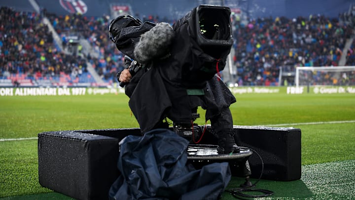 A cameraman works with a TV camera prior to the Serie A
